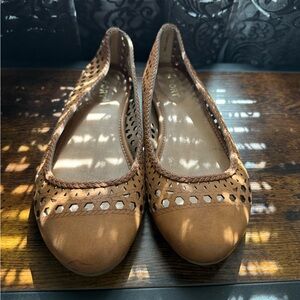 Brown leather flats